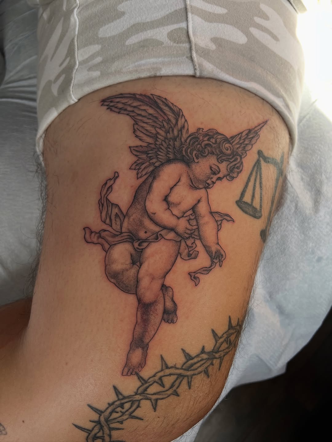 Tattoo by @justin_pino.sttn — realism, black_and_grey