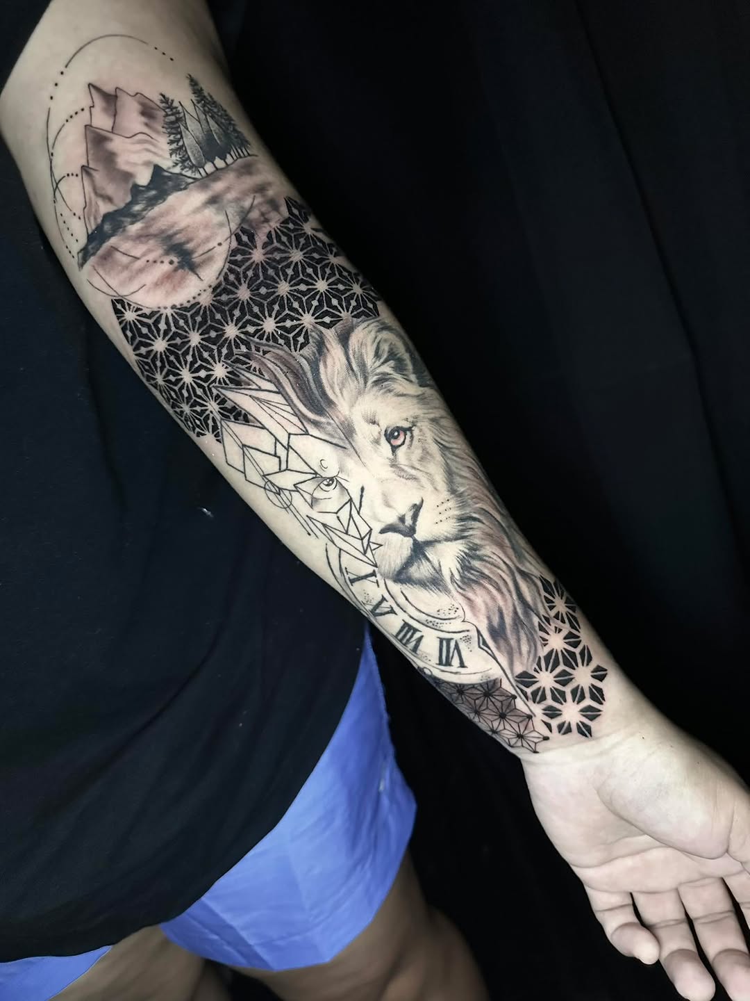 Tattoo by @stephenttattoos — realism, geometric