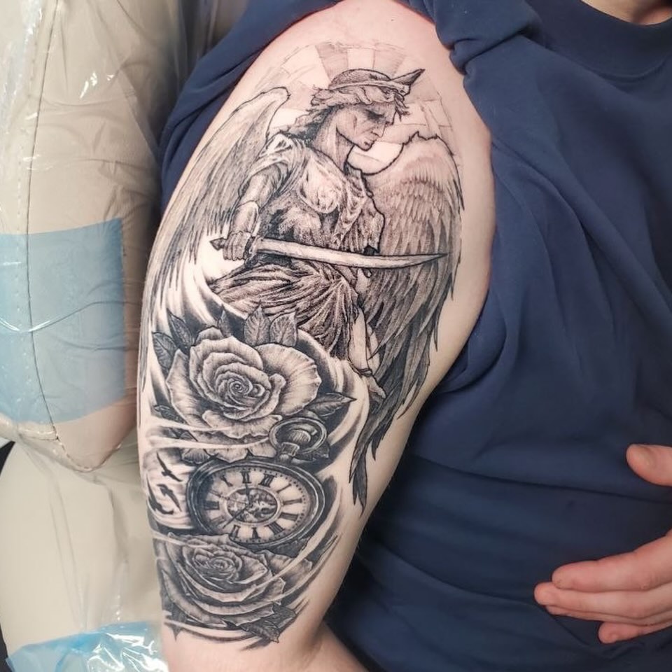 Tattoo by @lunchbox_ink — black_and_grey, realism