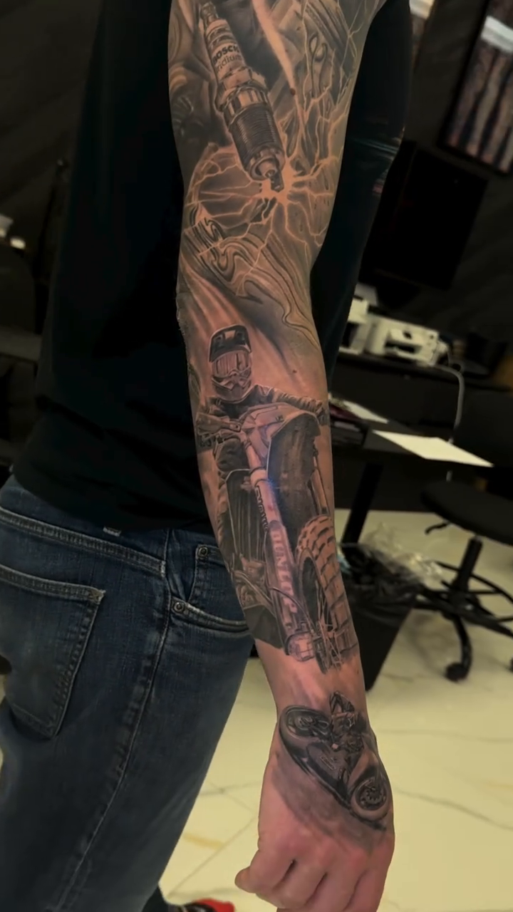 Tattoo by @tuannguyen_tattoo — realism, black_and_grey