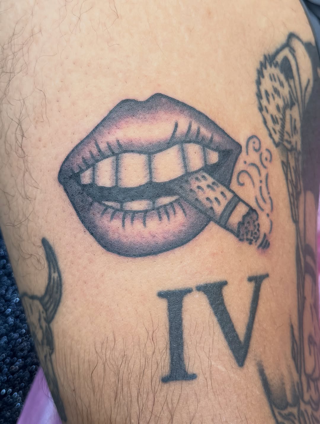 Tattoo by @tyler.raytat2 — black_and_grey, realism