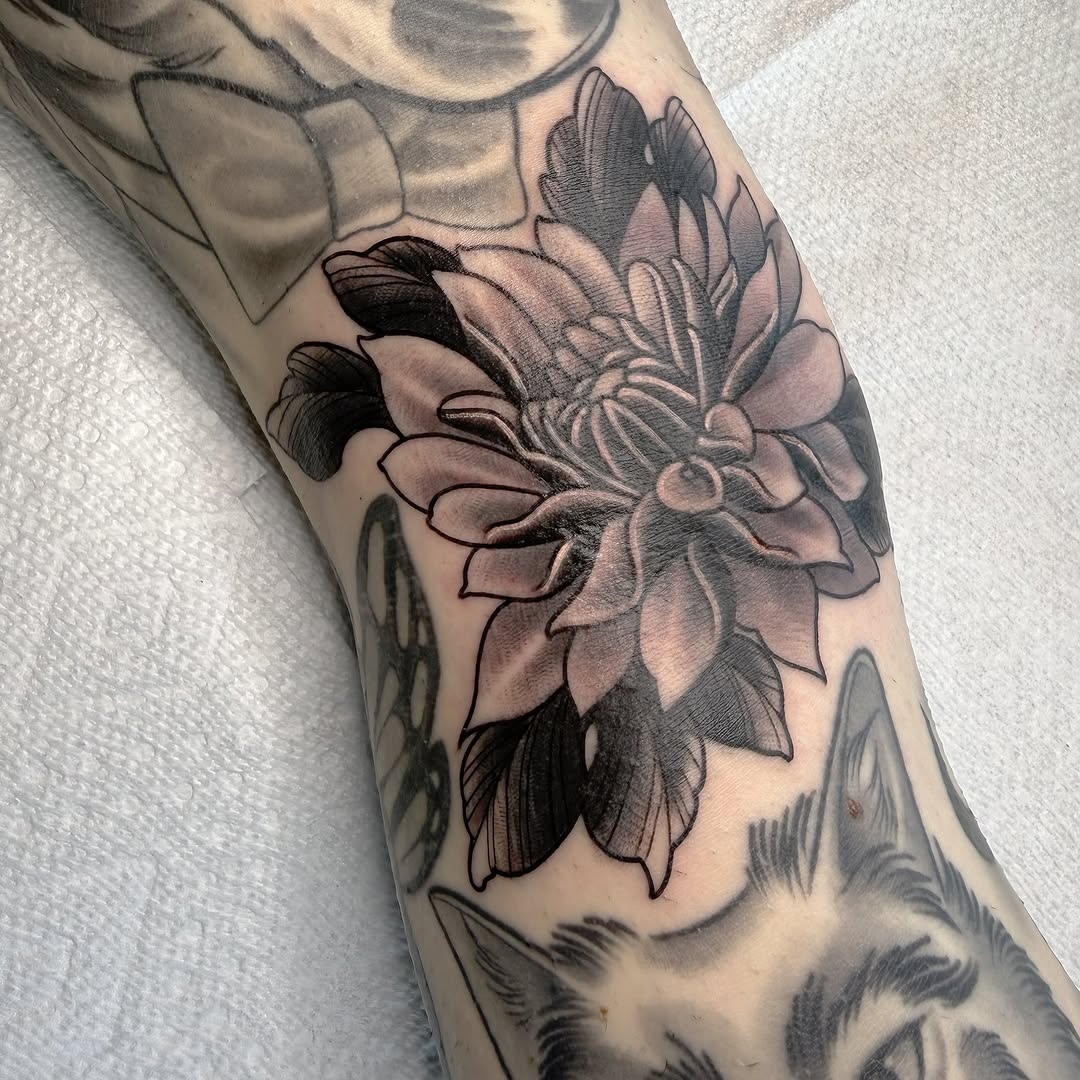 Tattoo by @booradleey — black_and_grey, realism