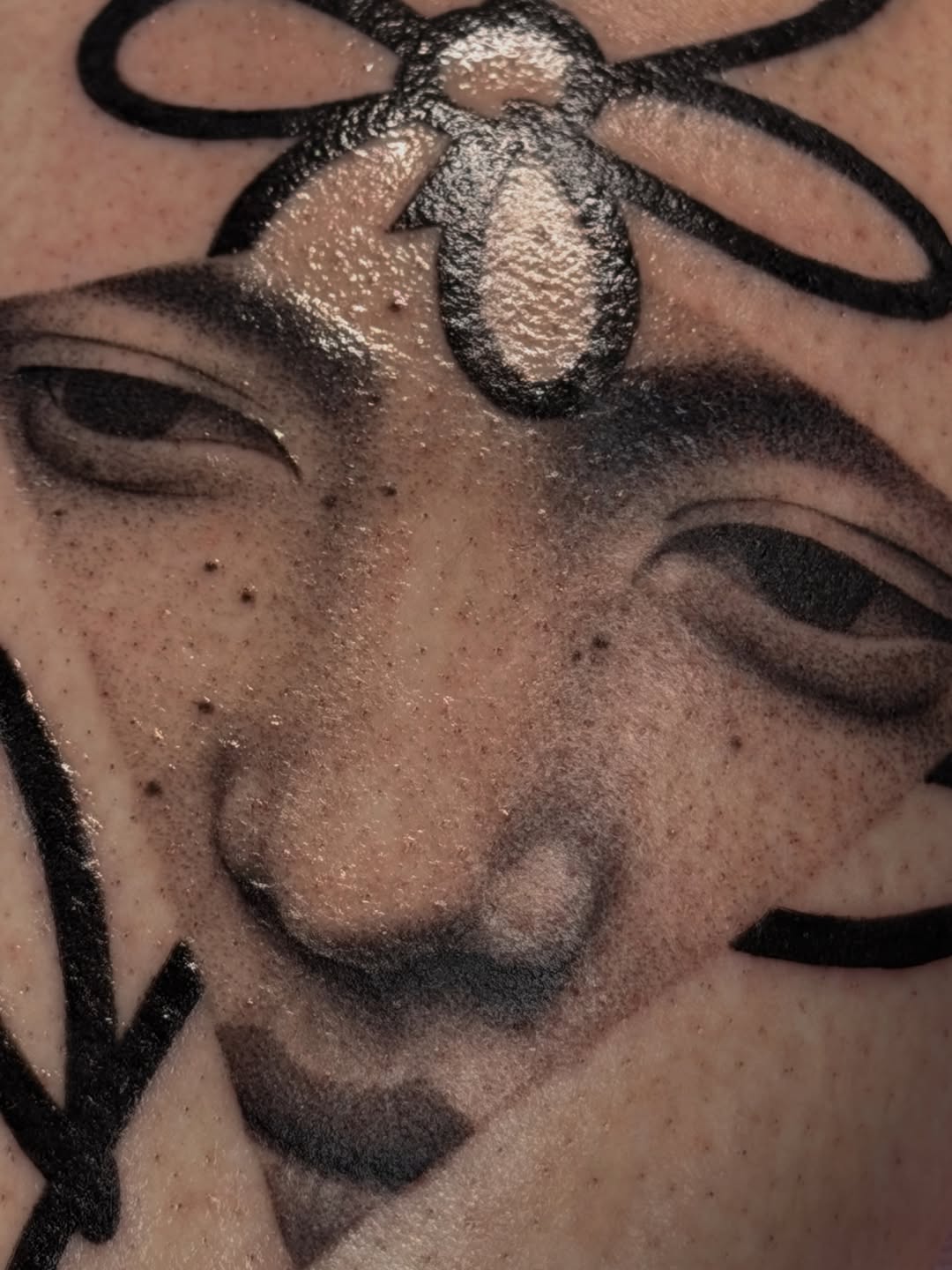 Tattoo by @uglyrae.tattoo — realism, black_and_grey