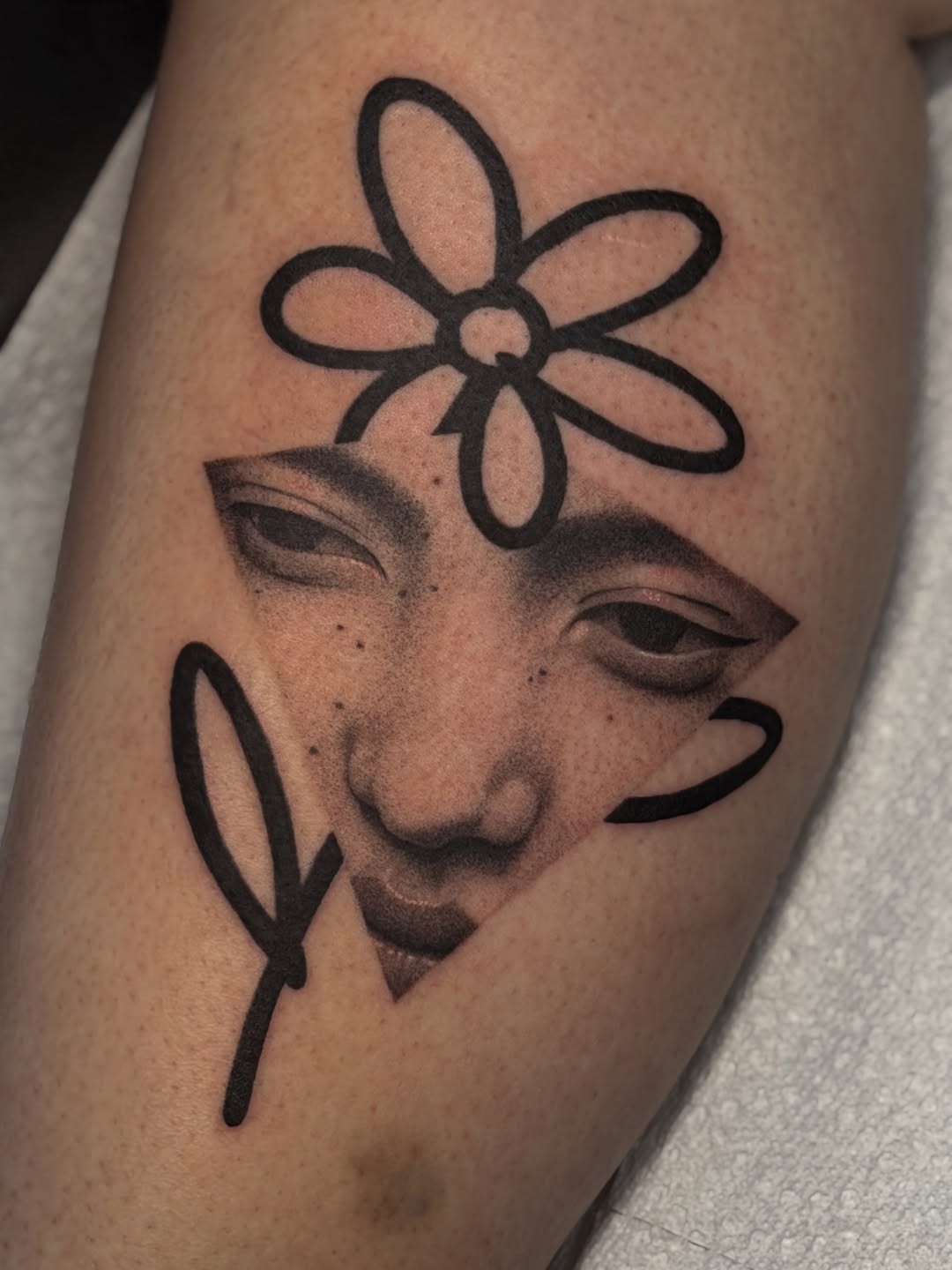 Tattoo by @uglyrae.tattoo — illustrative, black_and_grey