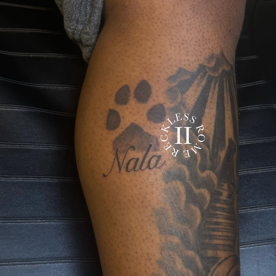 Tattoo by @2reckless__rome — lettering_script, black_and_grey