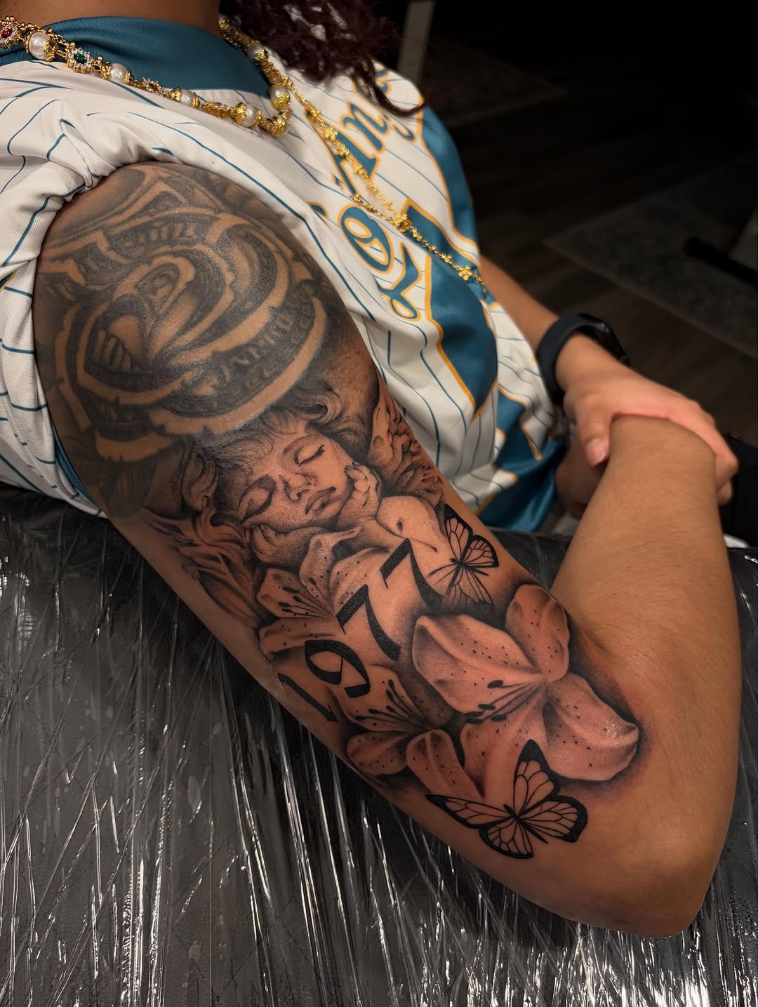 Tattoo by @auraink.studio β realism, black_and_grey