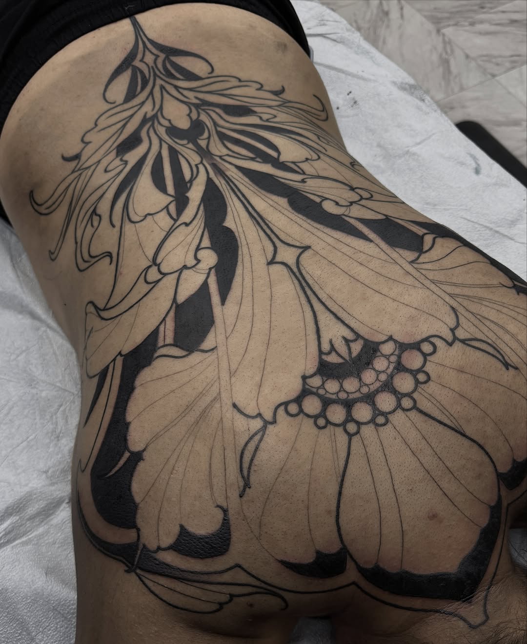 Tattoo by @dottedlines.2 — blackwork, illustrative