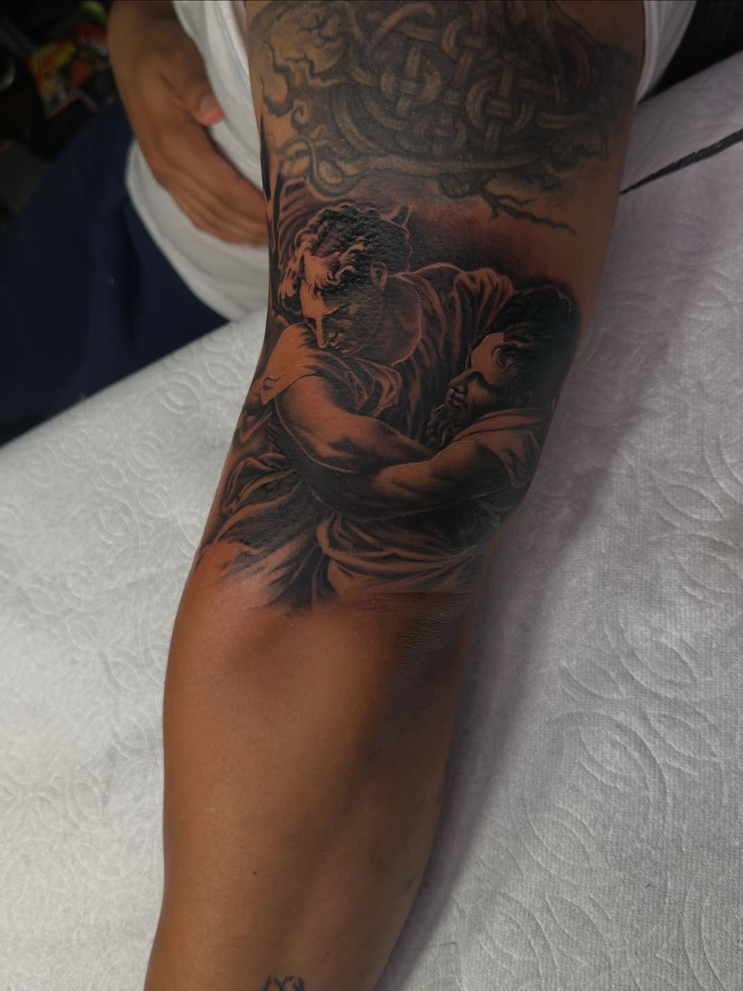 Tattoo by @inkmando — realism, black_and_grey