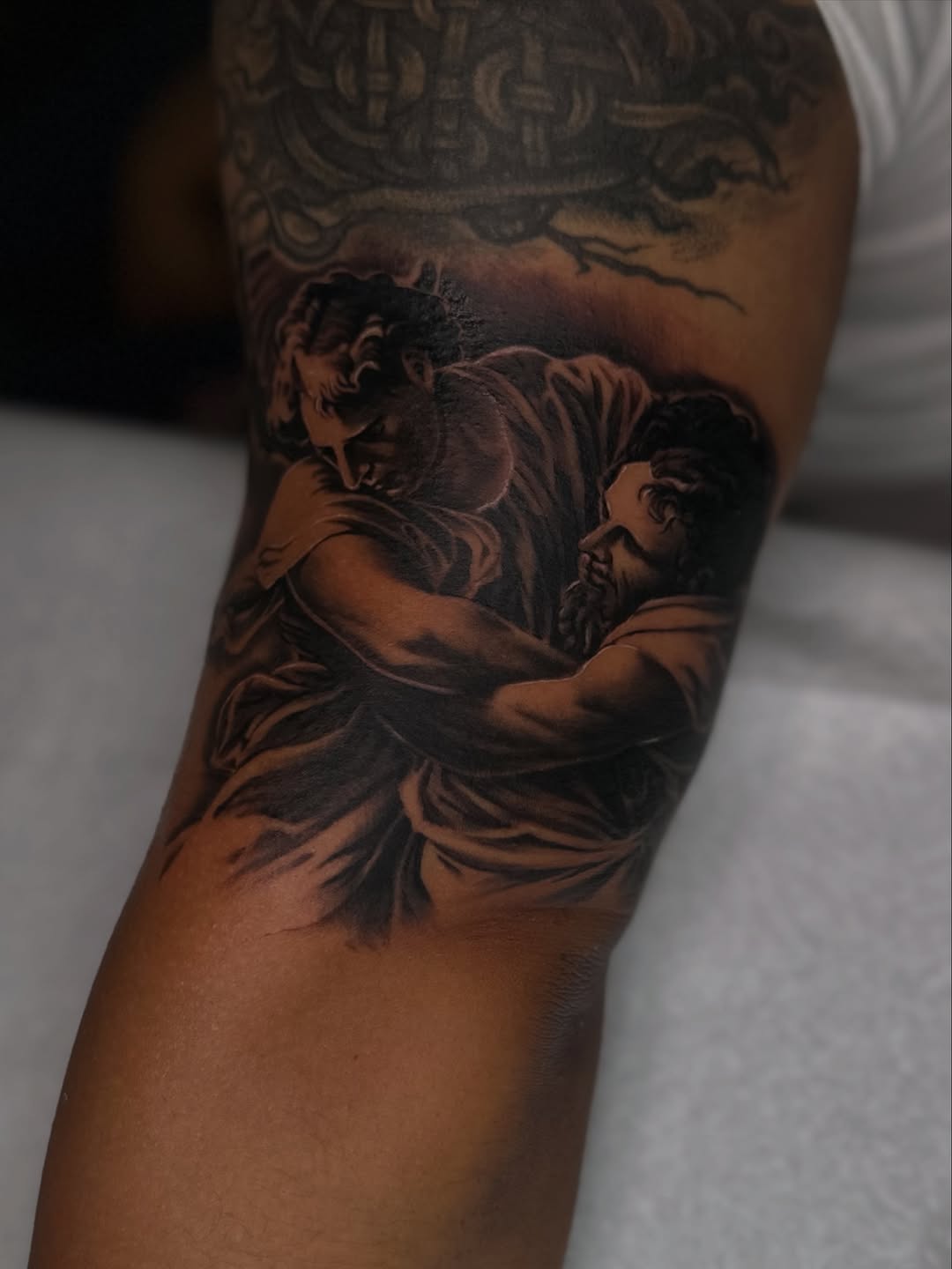 Tattoo by @inkmando — realism, black_and_grey