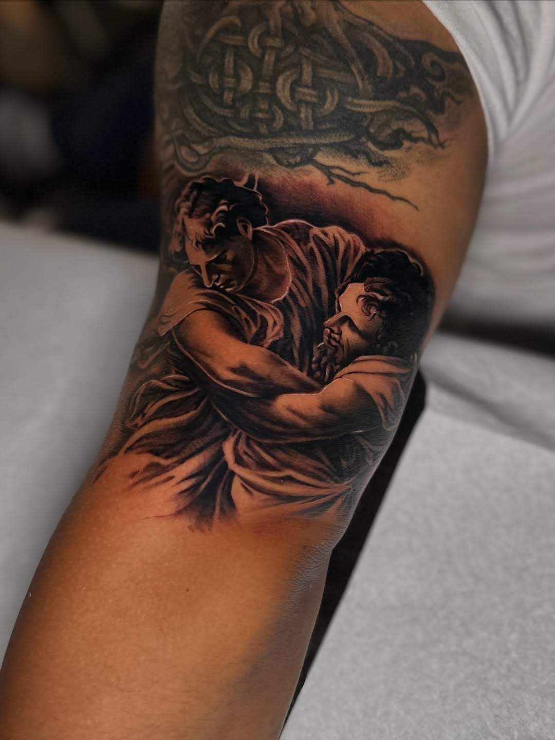 Tattoo by @inkmando — realism, black_and_grey