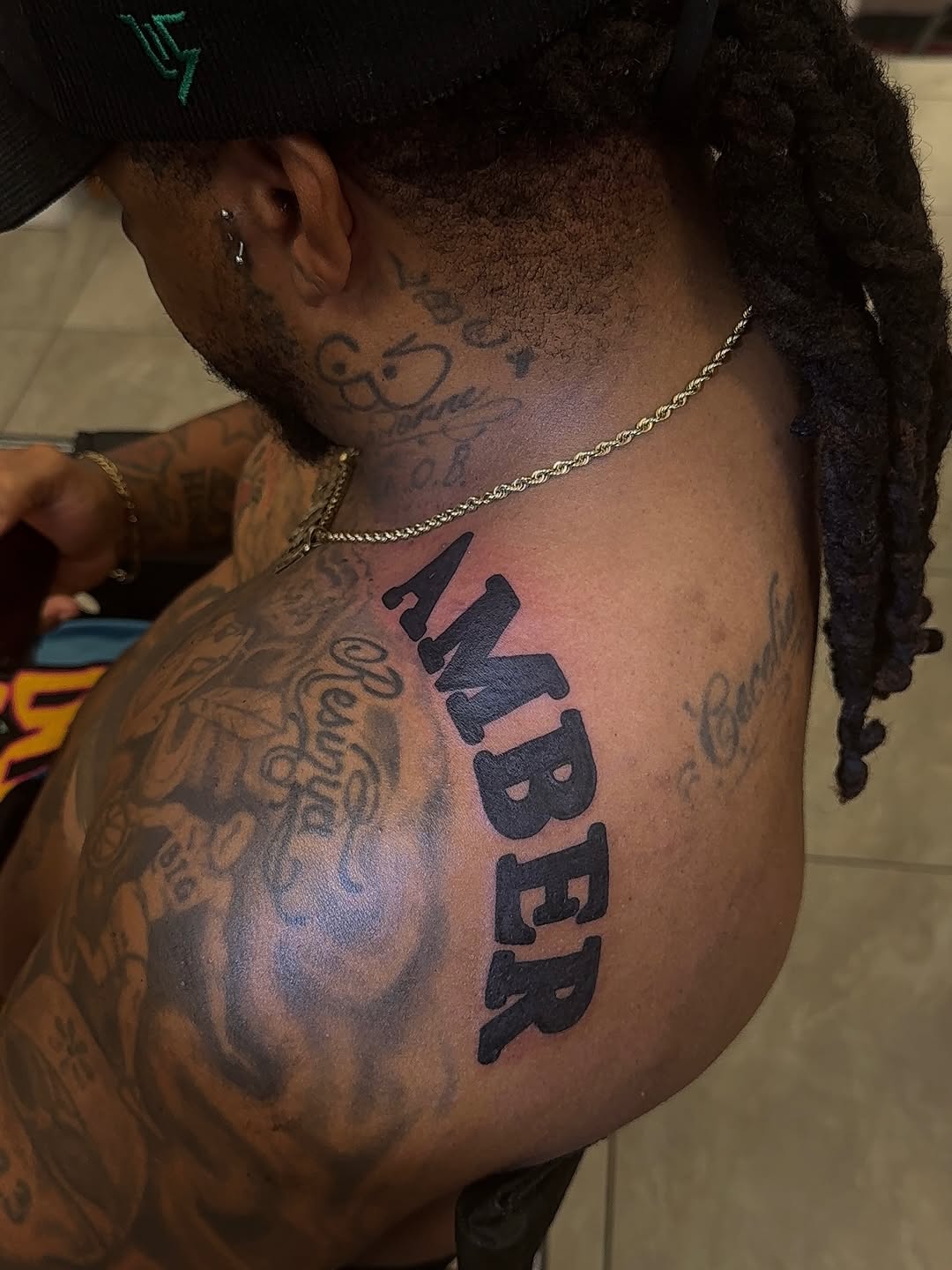 Tattoo by @xotic_inkk โ lettering_script, blackwork