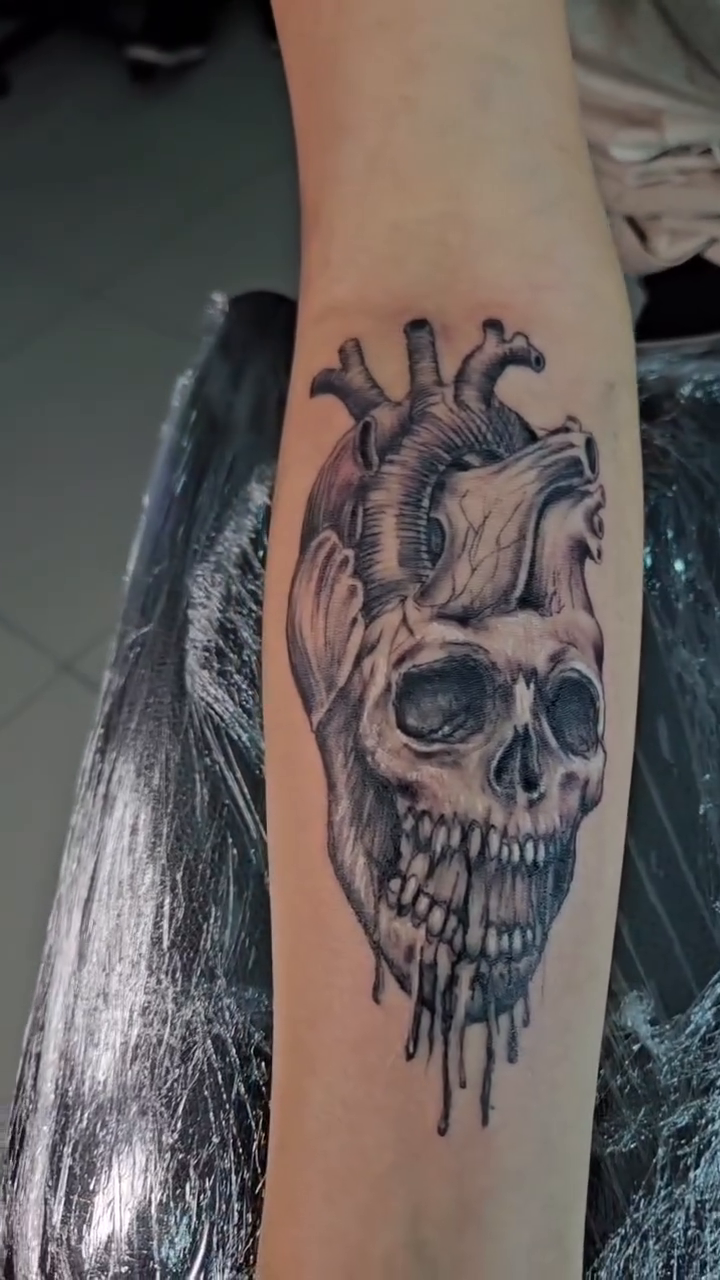 Tattoo by @aguascali_firme — black_and_grey, dark_realism
