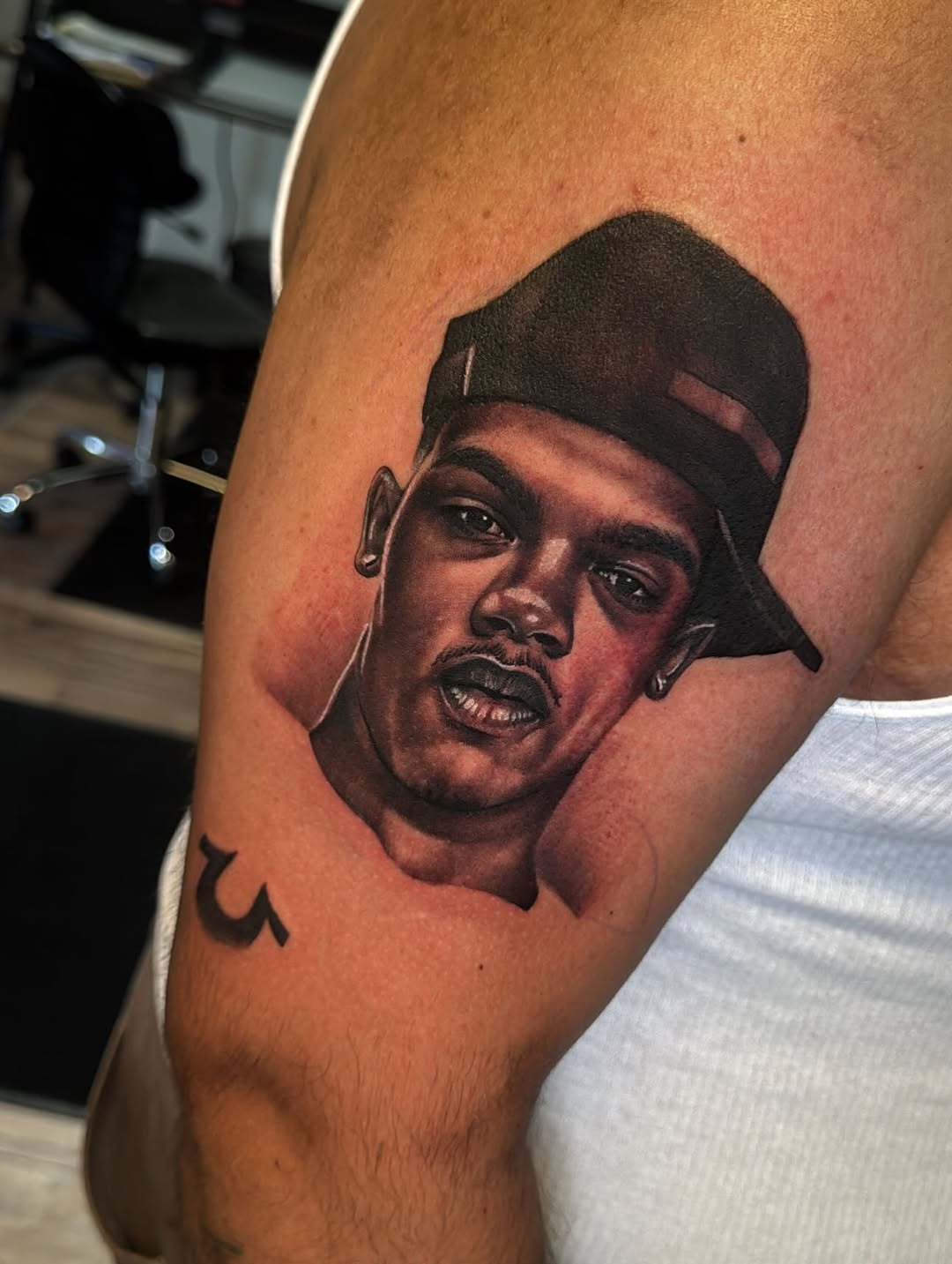 Tattoo by @crea8tive_director โ realism, black_and_grey