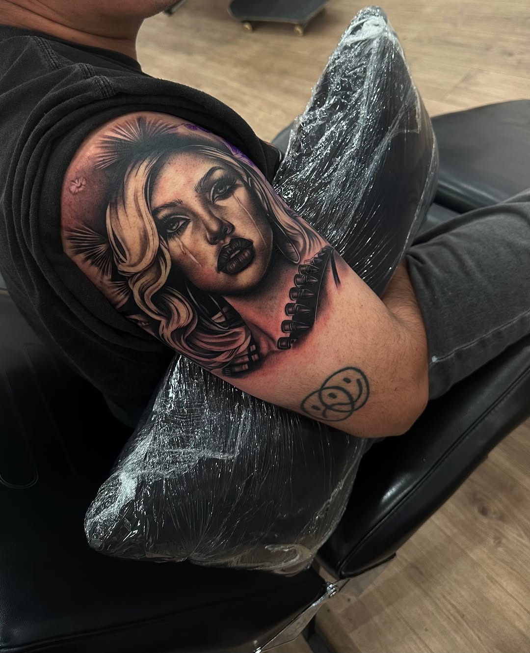 Tattoo by @inkedbydoll — realism, black_and_grey