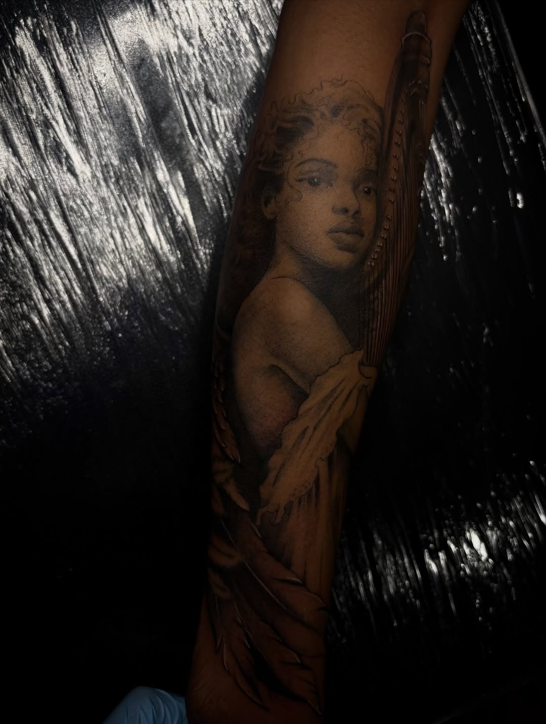 Tattoo by @inkby.lee โ realism, black_and_grey