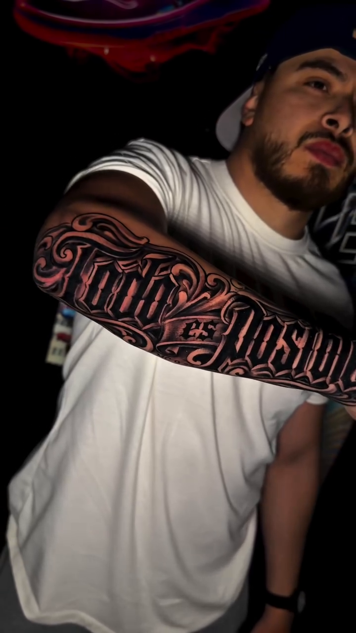 Tattoo by @jeisson.ink — lettering_script, chicano