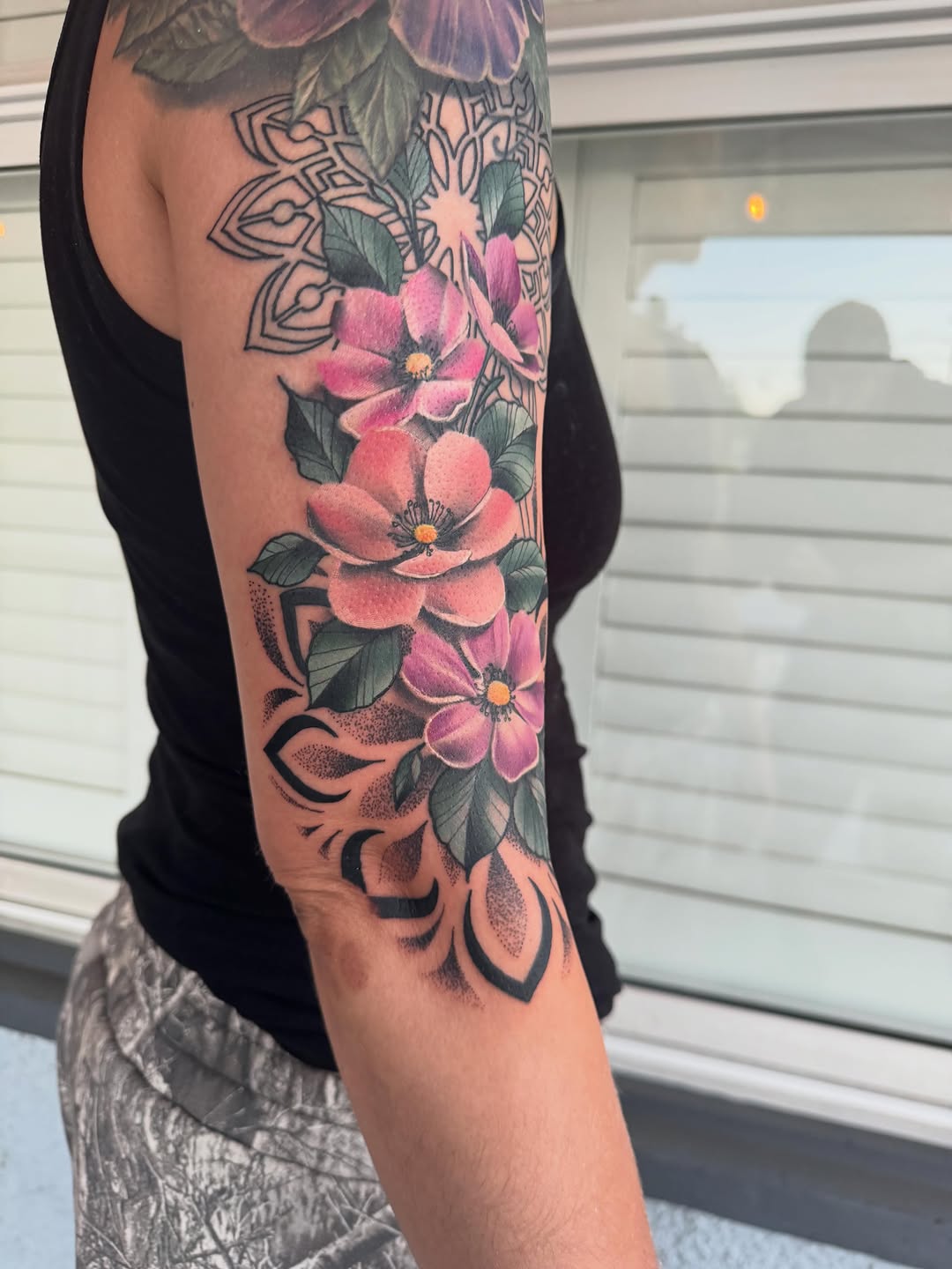 Tattoo by @travisbrowntattoos — realism, dotwork