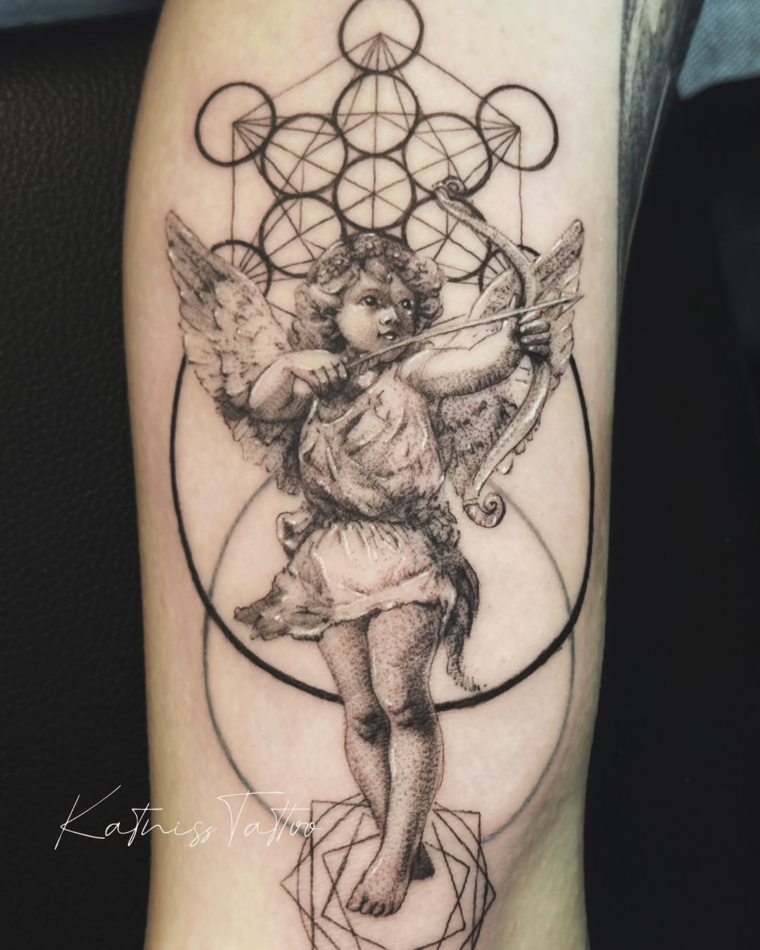 Tattoo by @circletattoo.katniss — black_and_grey, illustrative