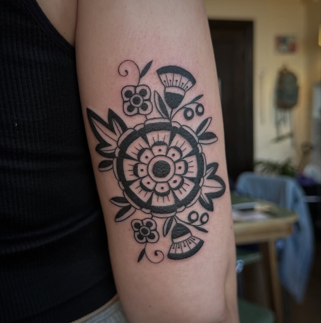 Tattoo by @leahearltattoo — blackwork