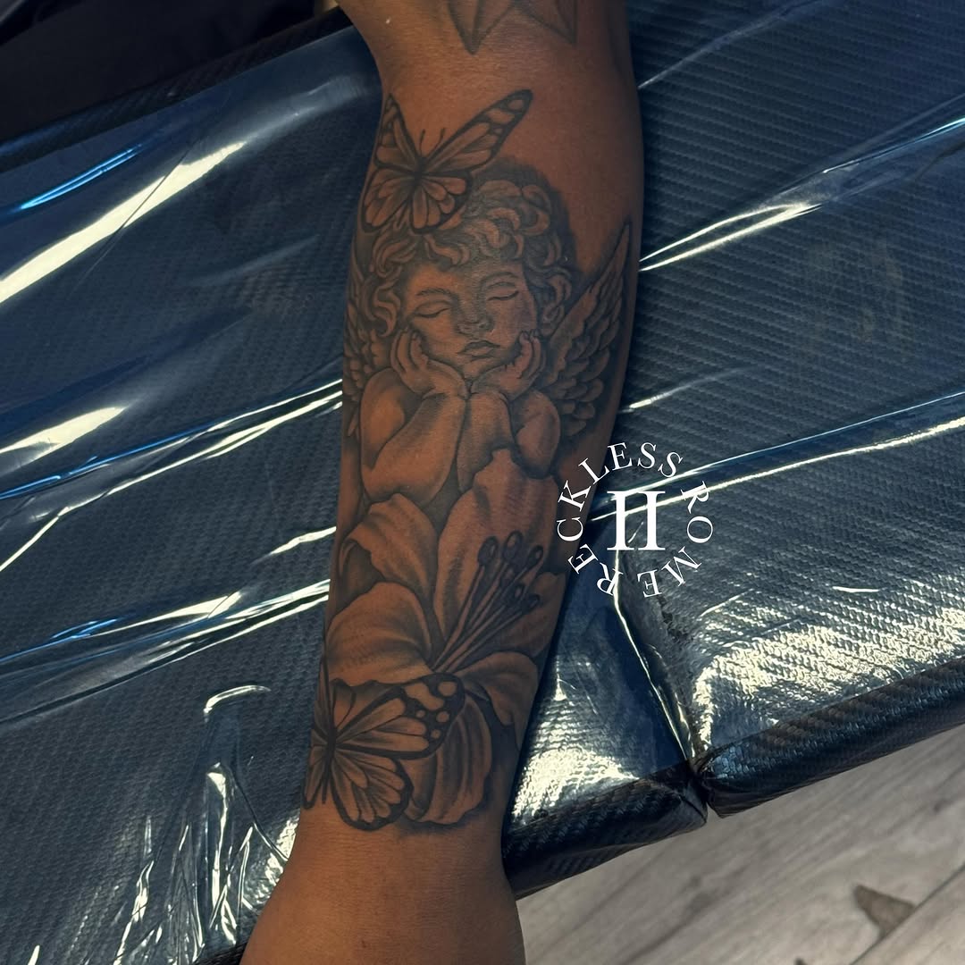 Tattoo by @2reckless__rome — black_and_grey, realism