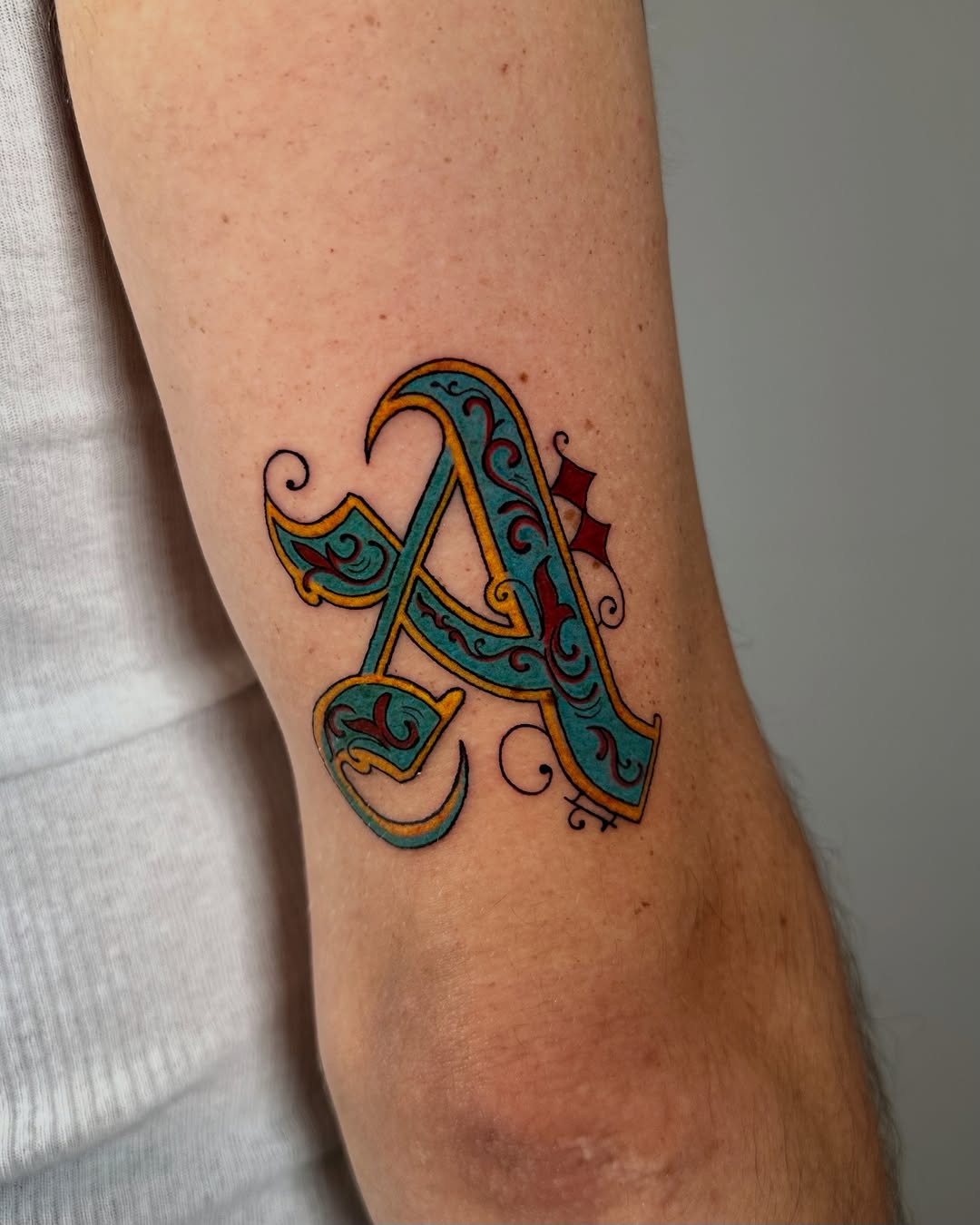 Tattoo by @zigzag_tattoo — lettering_script, ornamental