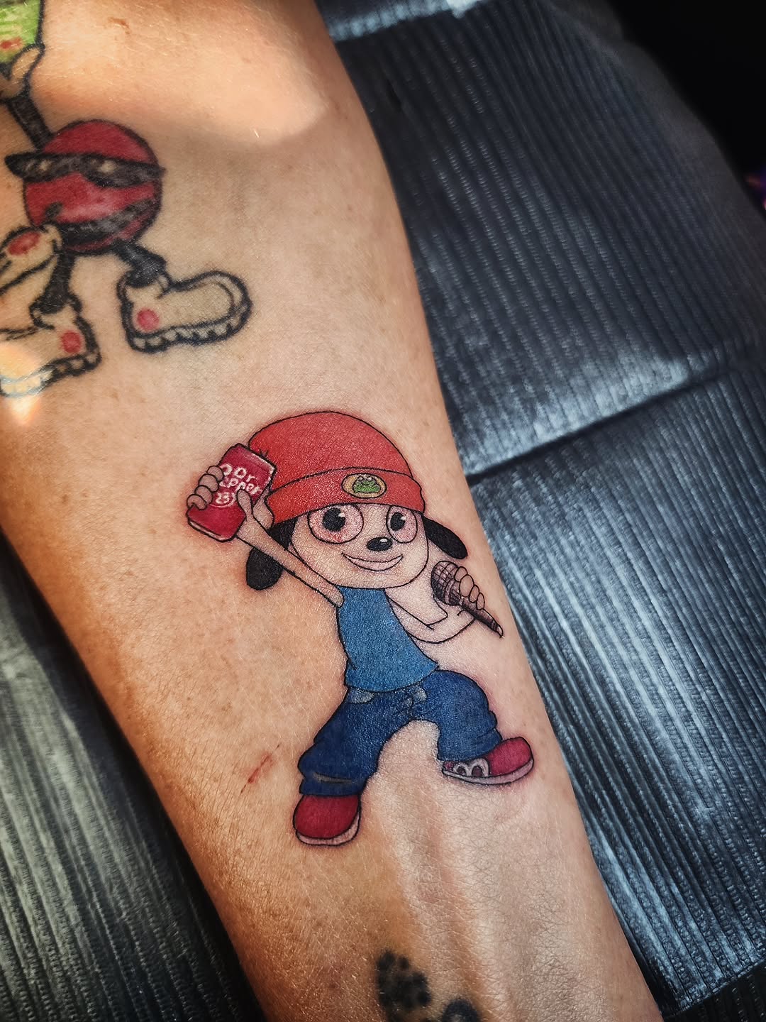Tattoo by @consumer.inkslinger.artist — illustrative, new_school