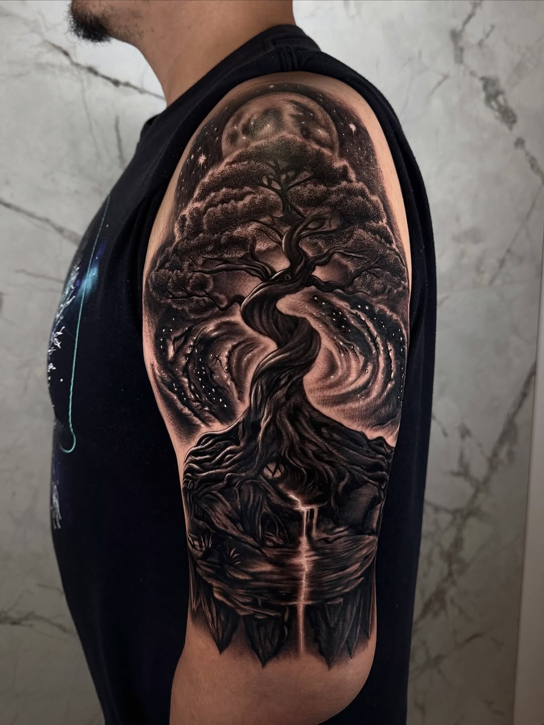 Tattoo by @fernxndojrtatts — realism, black_and_grey