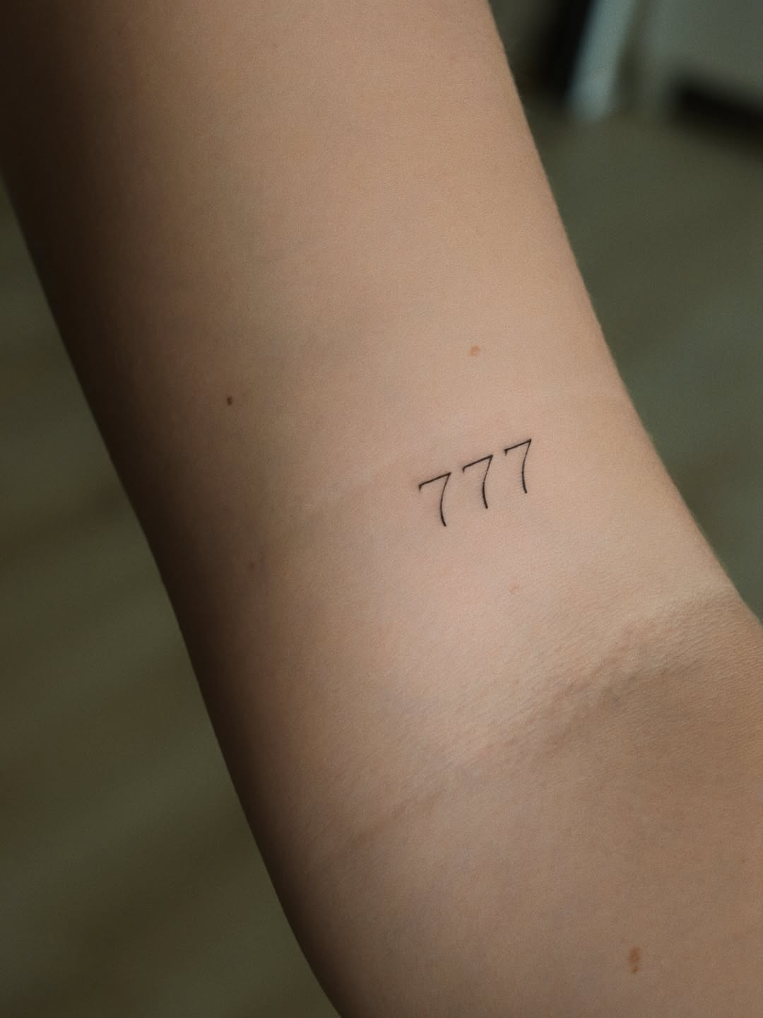 Tattoo by @auras.tattoos — fine_line, lettering_script