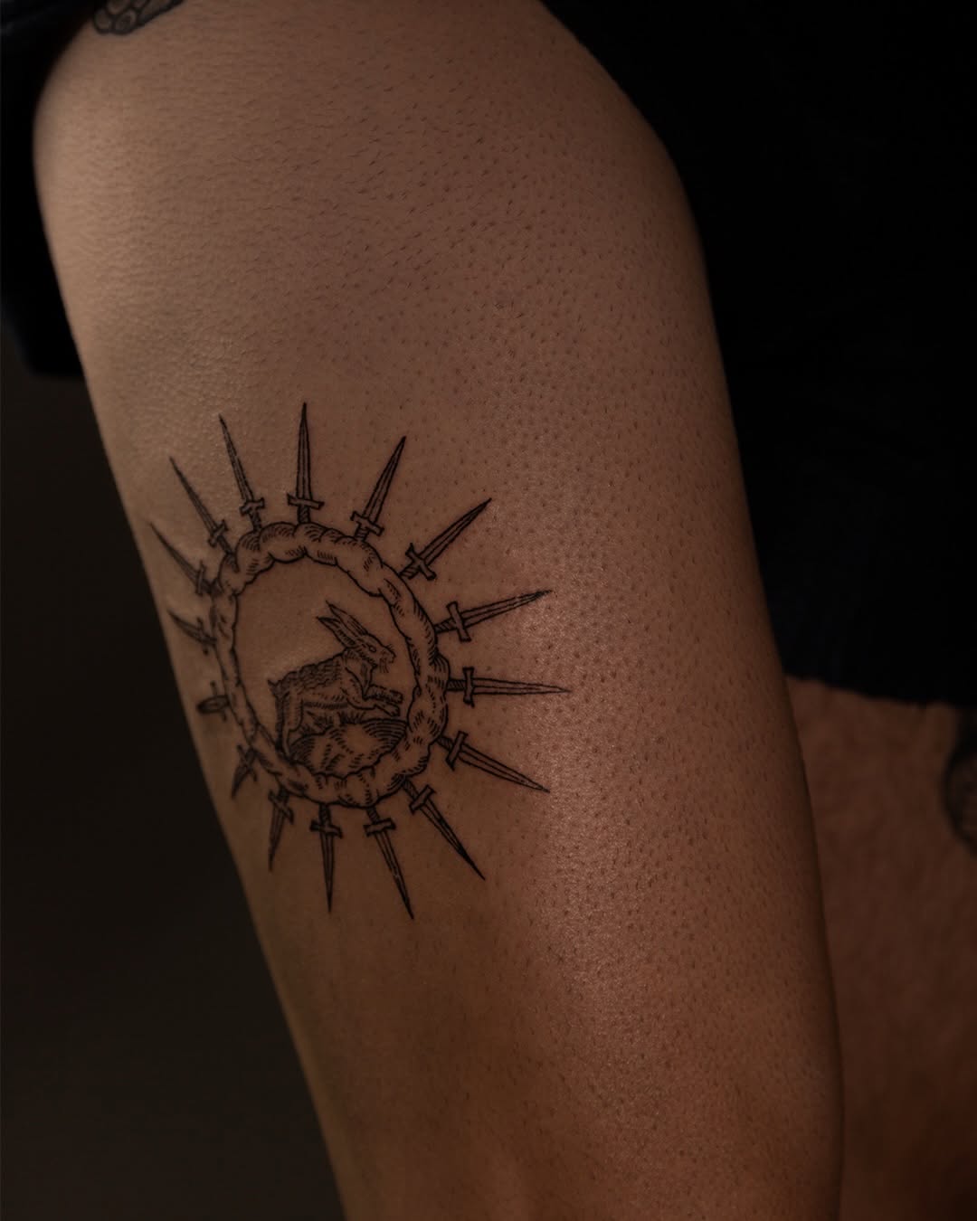 Tattoo by @brak.ttt — illustrative, blackwork