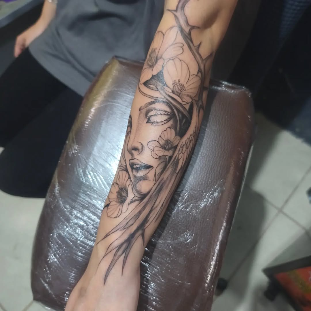 Tattoo by @mello_blue_tatto0 — realism, black_and_grey
