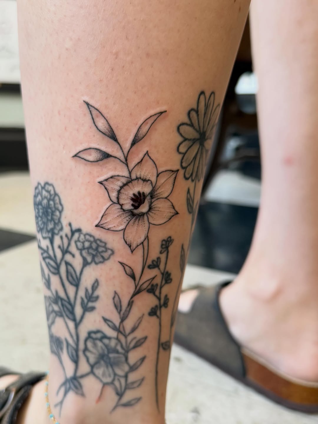 Tattoo by @calebgreen.tattoo — fine_line, black_and_grey