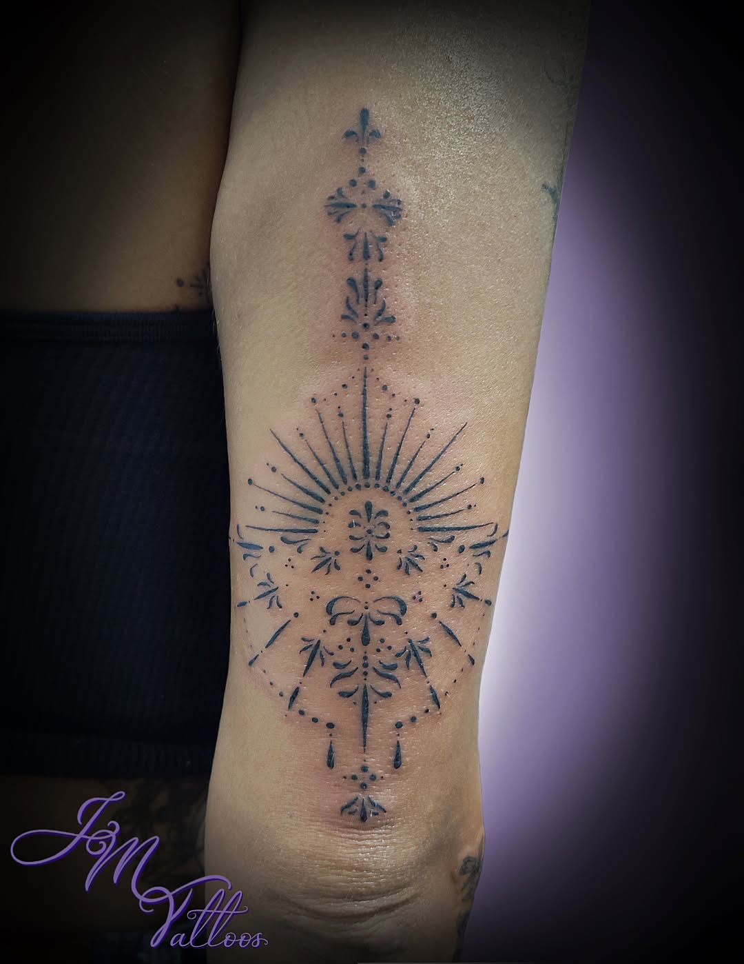 Tattoo by @julies.tattoos — geometric, dotwork
