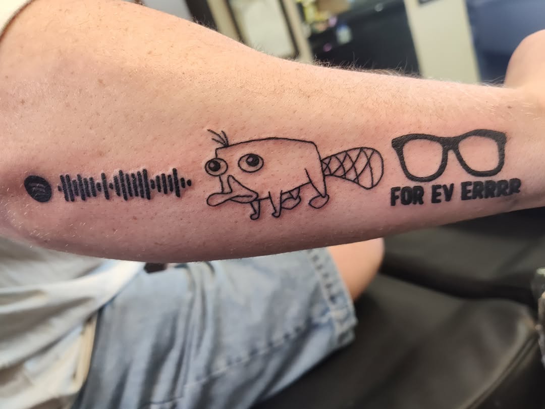 Tattoo by @art_from_planetmercury — illustrative, lettering_script