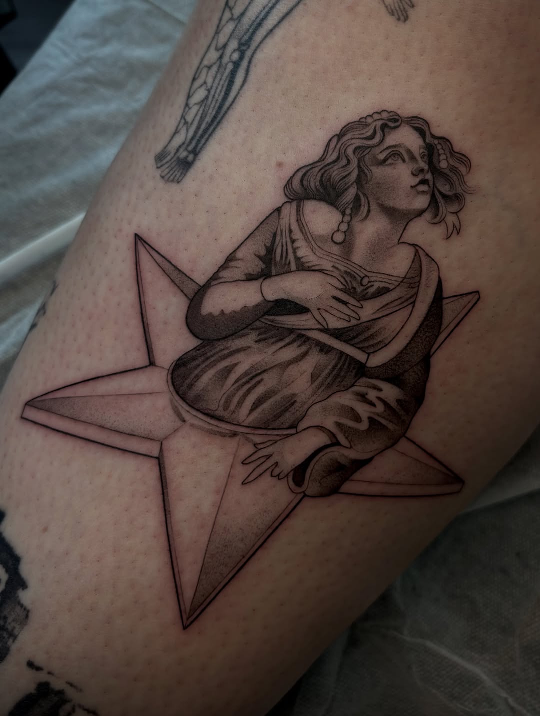 Tattoo by @tattoosbymeach — black_and_grey, realism