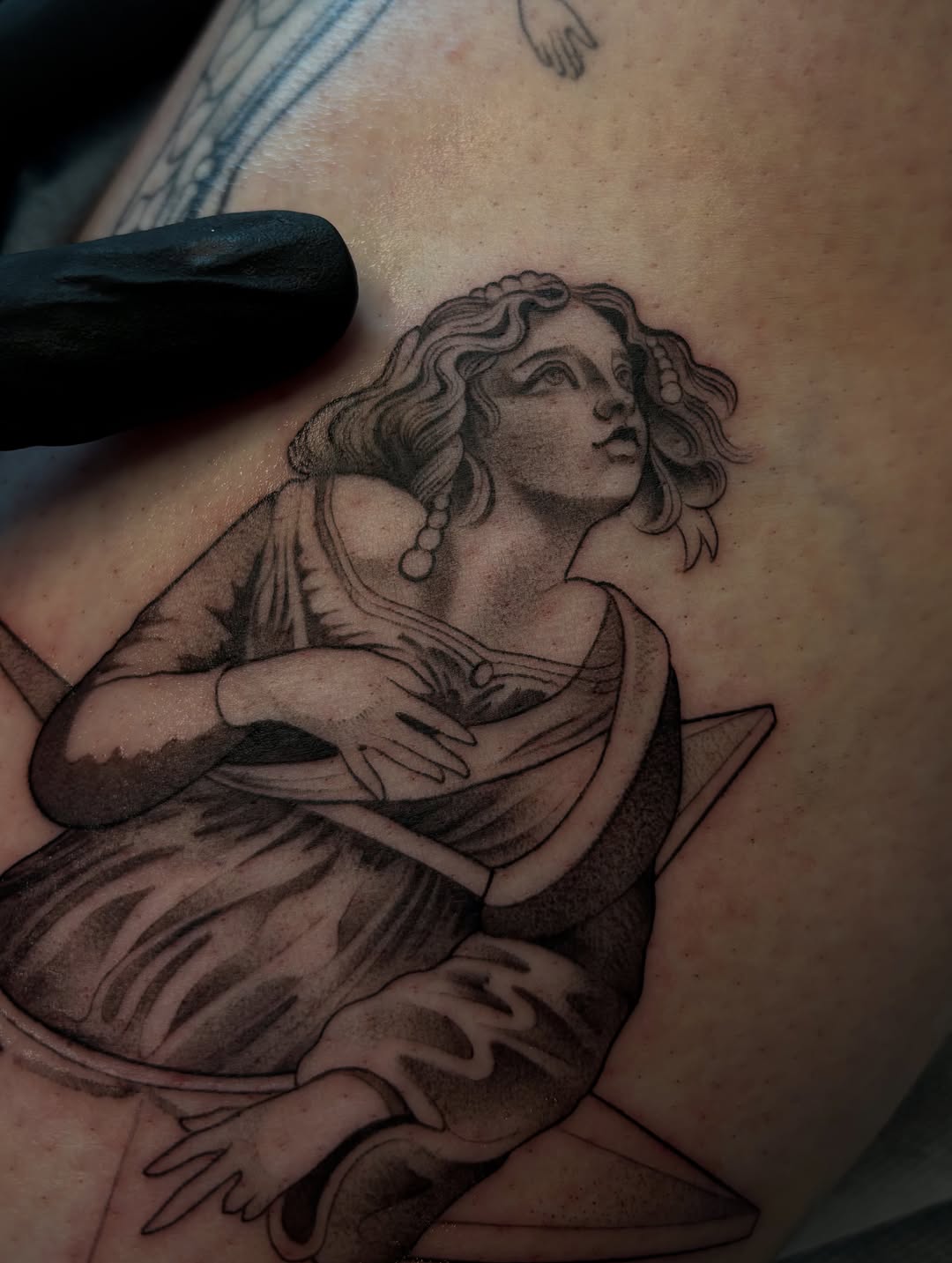 Tattoo by @tattoosbymeach — realism, black_and_grey