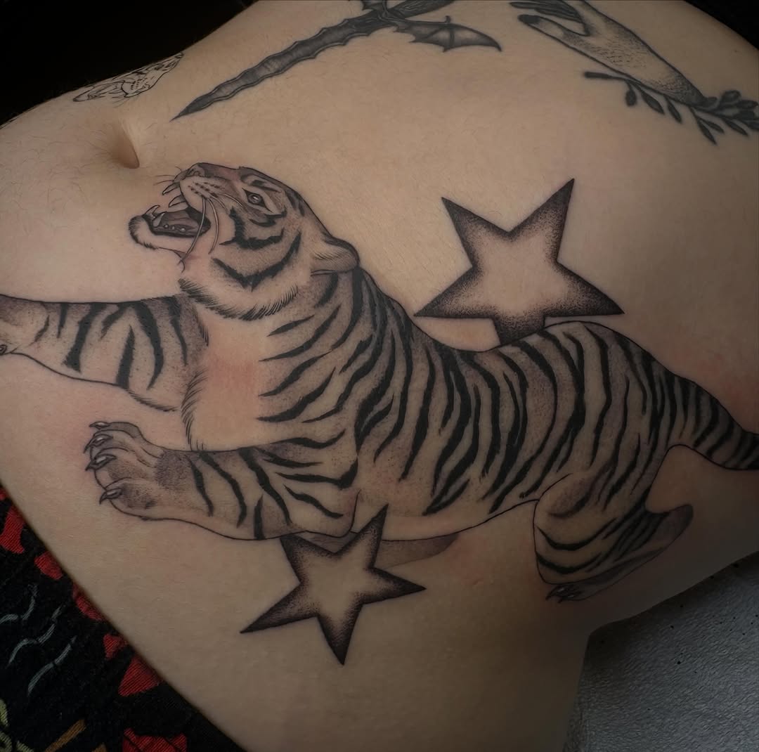Tattoo by @mela.tattooer — black_and_grey