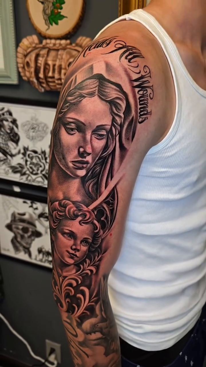 Tattoo by @tattoos.by.rey — black_and_grey, realism