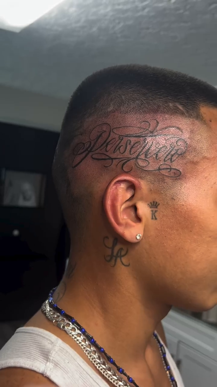 Tattoo by @mena_tats — lettering_script, chicano
