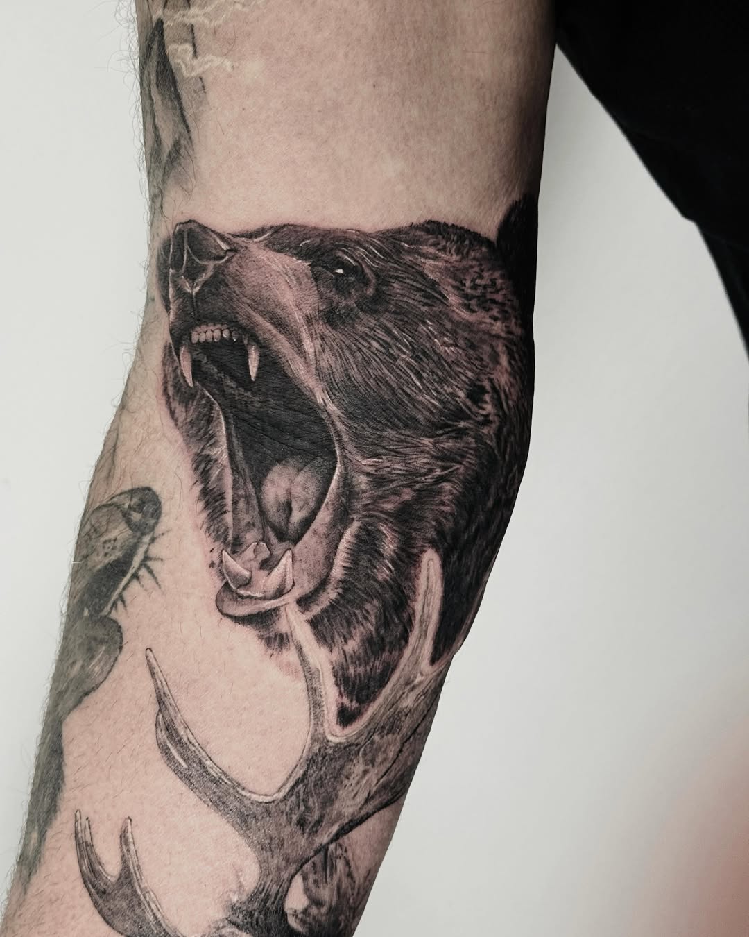 Tattoo by @nonoka_tattoo — realism, black_and_grey
