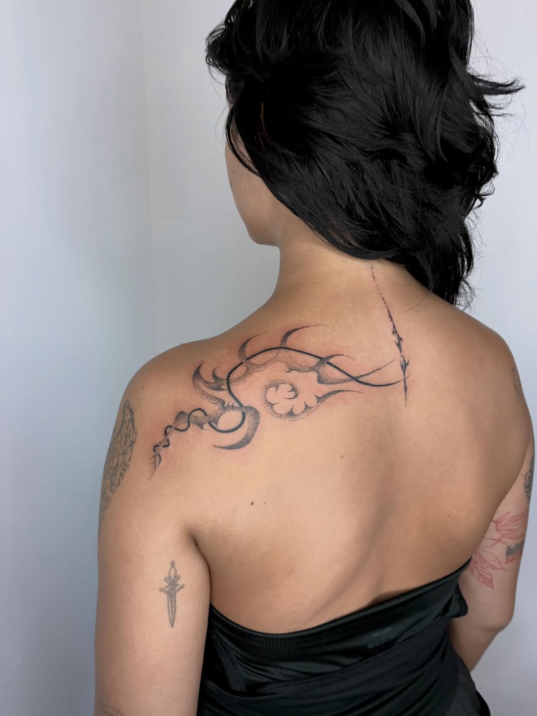 Tattoo by @geisha_ocelotl — illustrative, dotwork