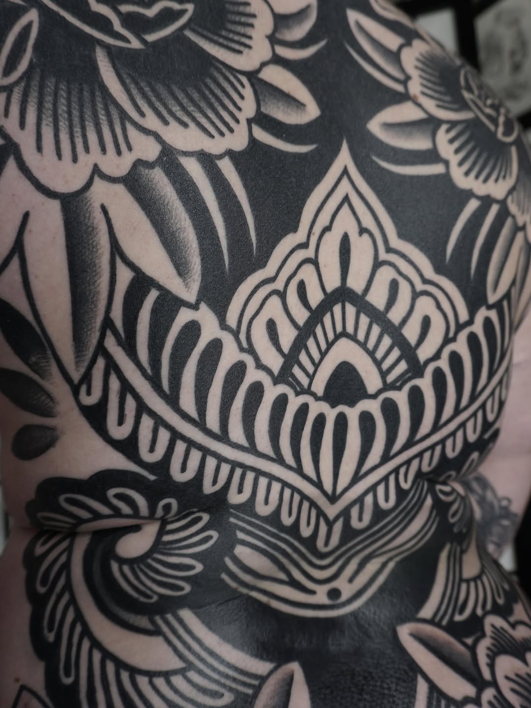 Tattoo by @sarahxtinetattoo — blackwork, ornamental