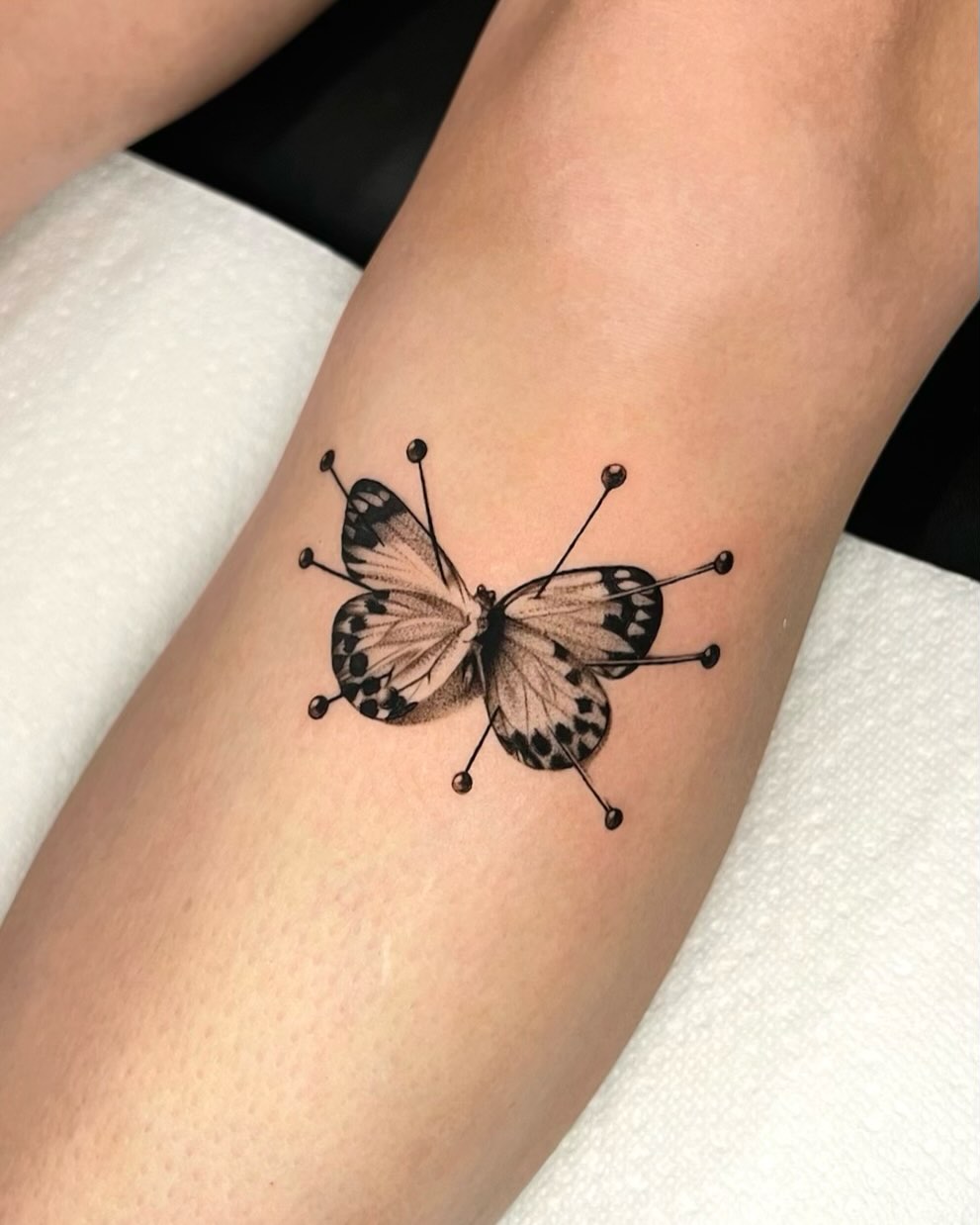 Tattoo by @__ink.doll__ — black_and_grey, realism
