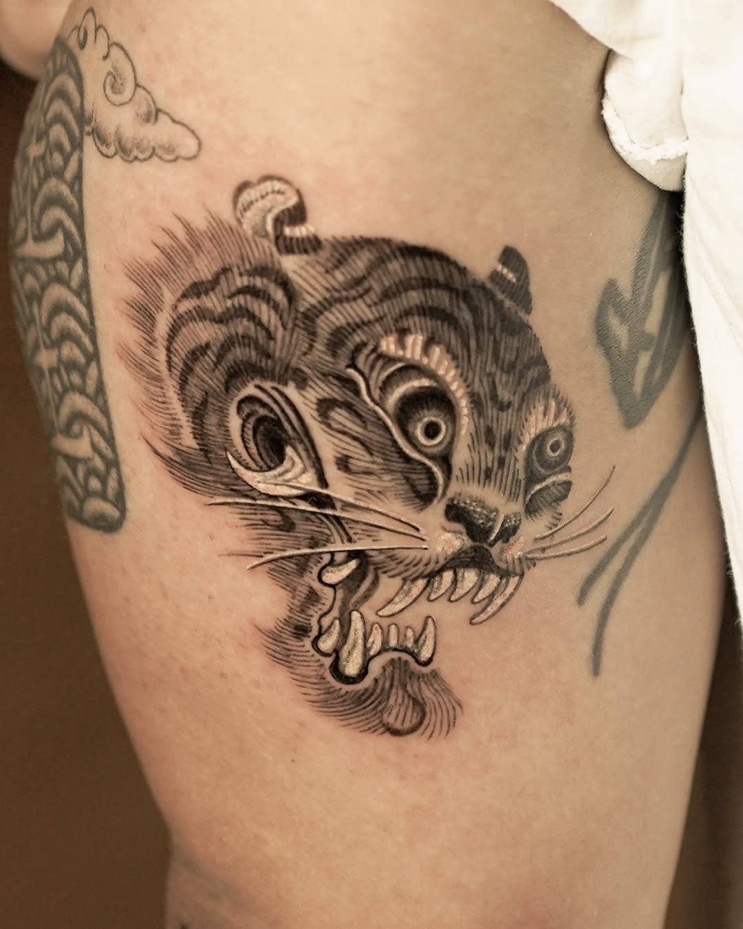 Tattoo by @think_tatt — black_and_grey, illustrative