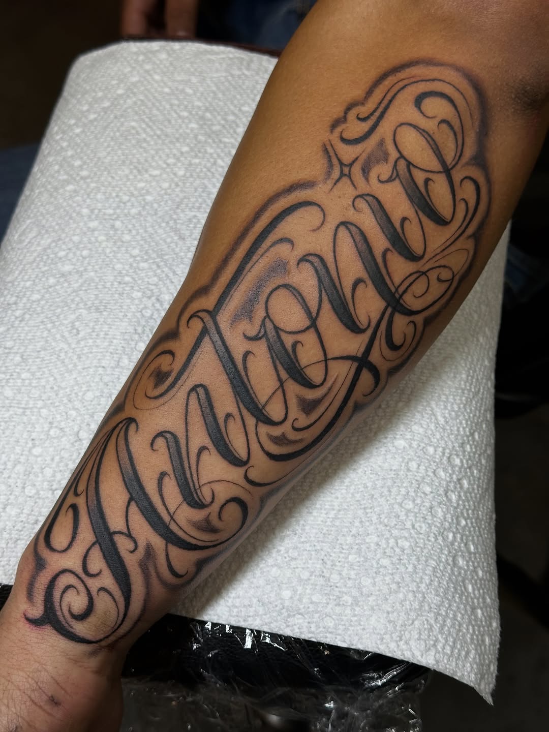 Tattoo by @jordan.piro.tattoo — lettering_script, chicano