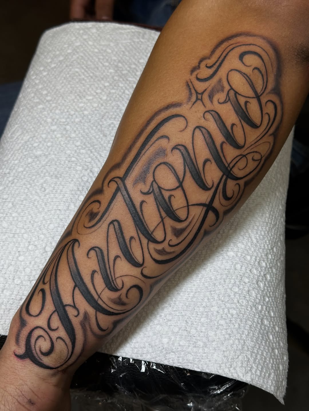 Tattoo by @jordan.piro.tattoo — lettering_script, chicano