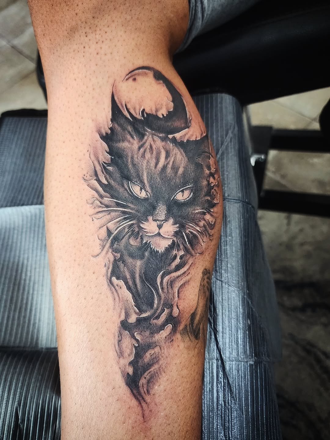 Tattoo by @consumer.inkslinger.artist — black_and_grey, realism