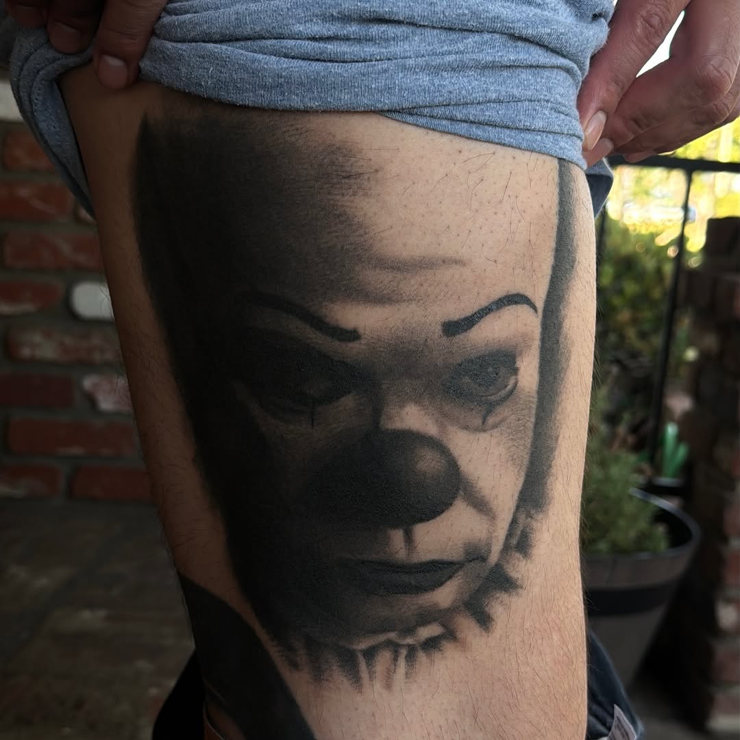 Tattoo by @the_horrordude — realism, black_and_grey