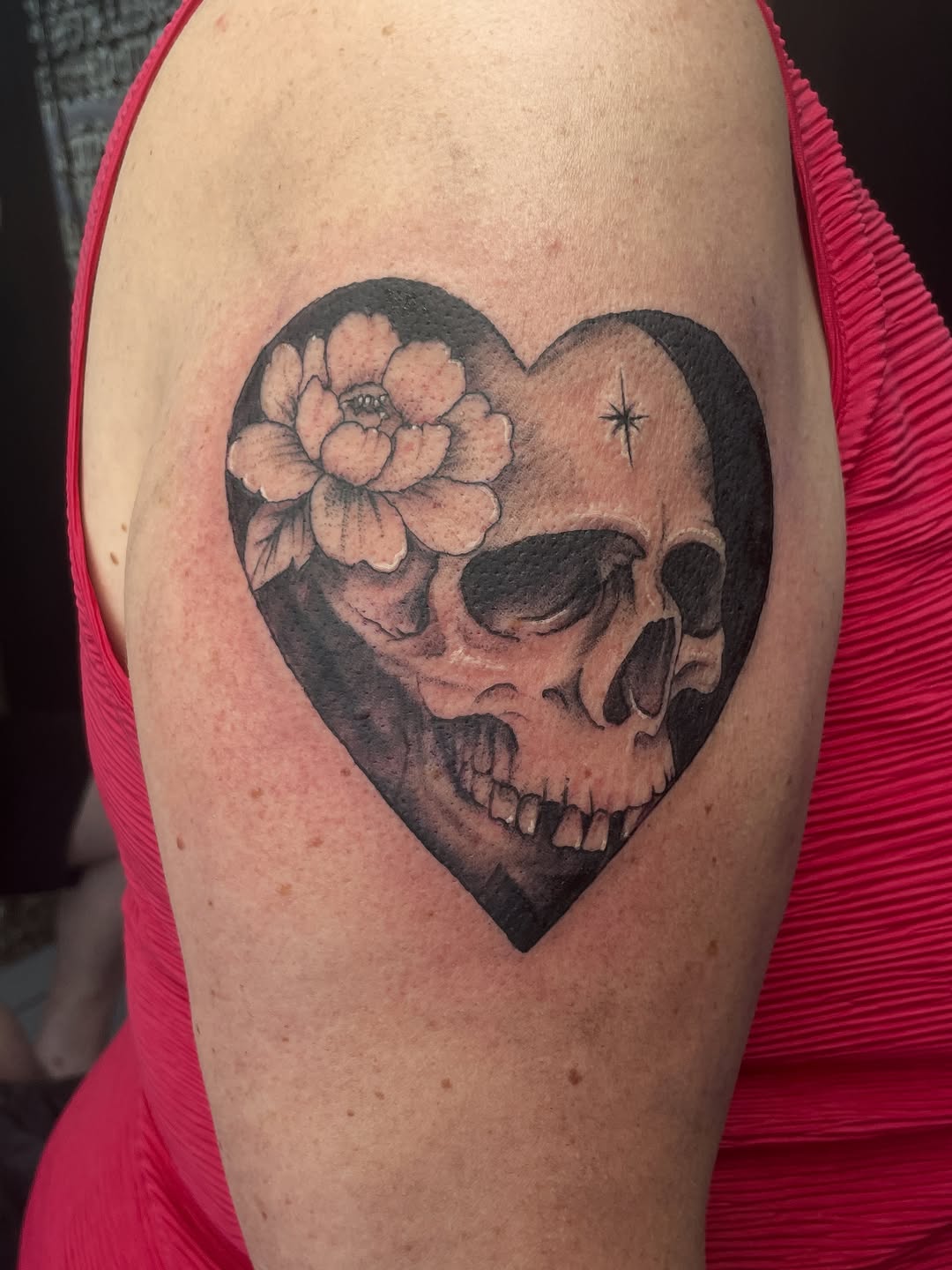 Tattoo by @amber_noir_tattoo โ realism, black_and_grey