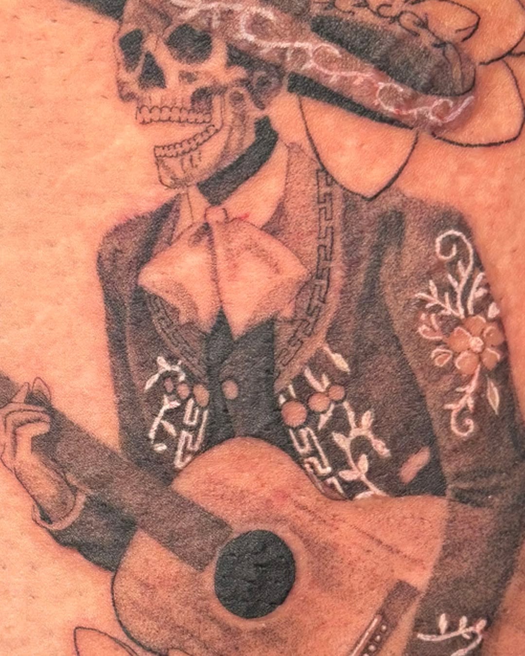 Tattoo by @ernieinks — realism, black_and_grey