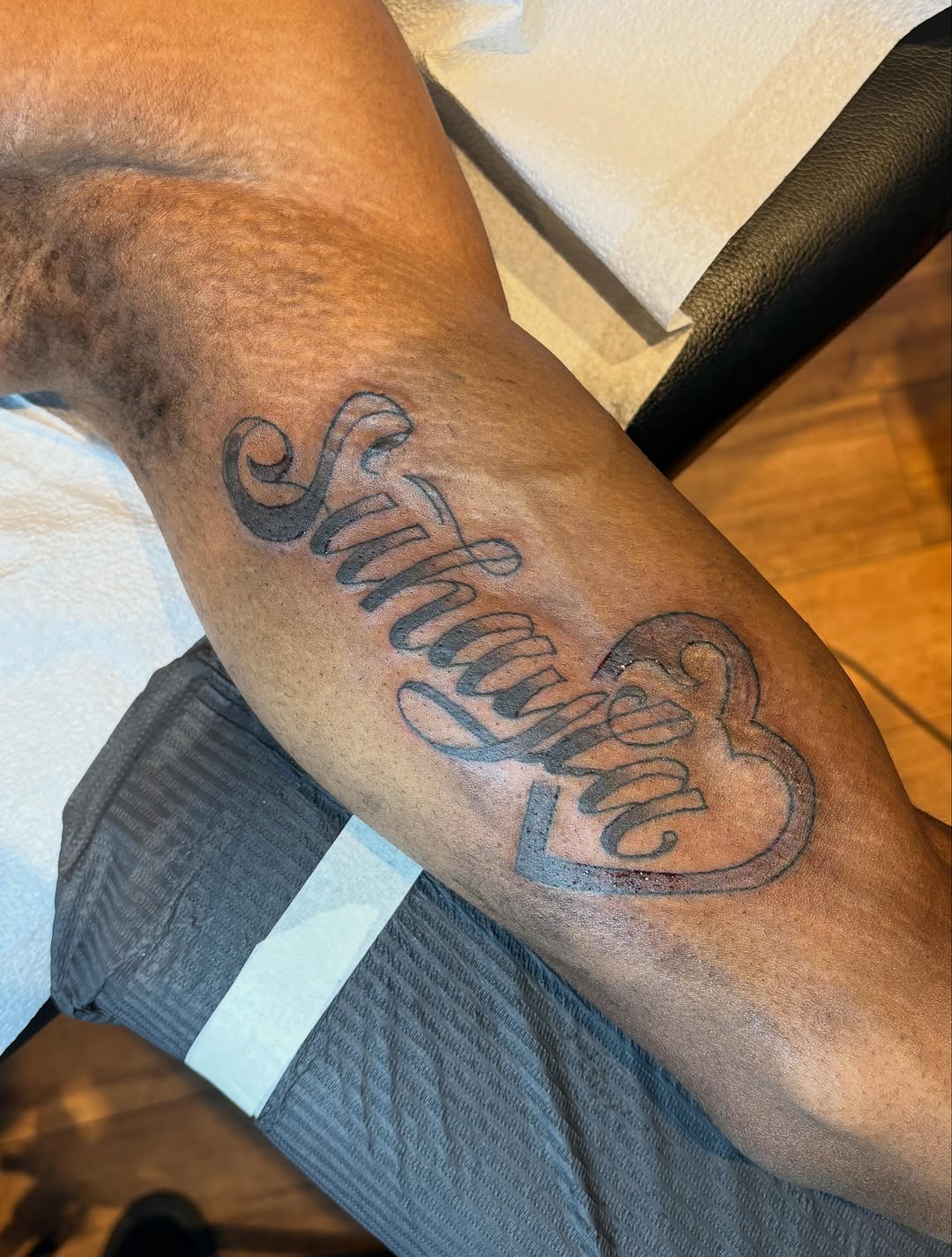 Tattoo by @skull.quest โ lettering_script, black_and_grey